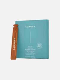 2 لوشن Relive Fortifier الفاخر للمرأة في علبة مع أداة تطبيق برتقالية، مصمم لتجديد البشرة بالكافيين ومكونات نشطة أخرى.